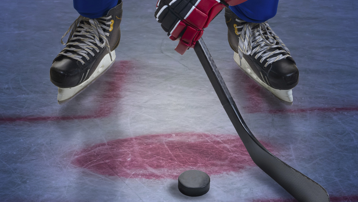 Hockey puck and skates