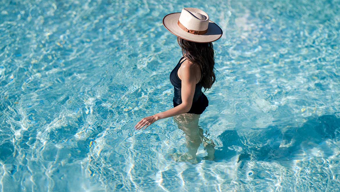 Woman standing in the pool