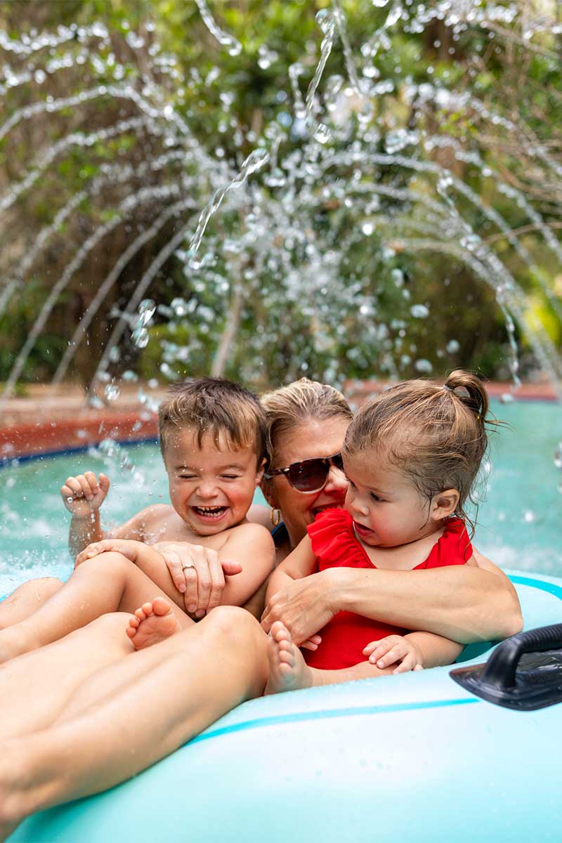 Mom and kids on pool float