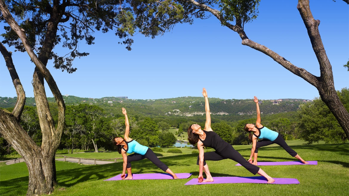 Ladies practicing yoga at Barton Creek
