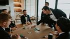Groomsmen playing cards. 
