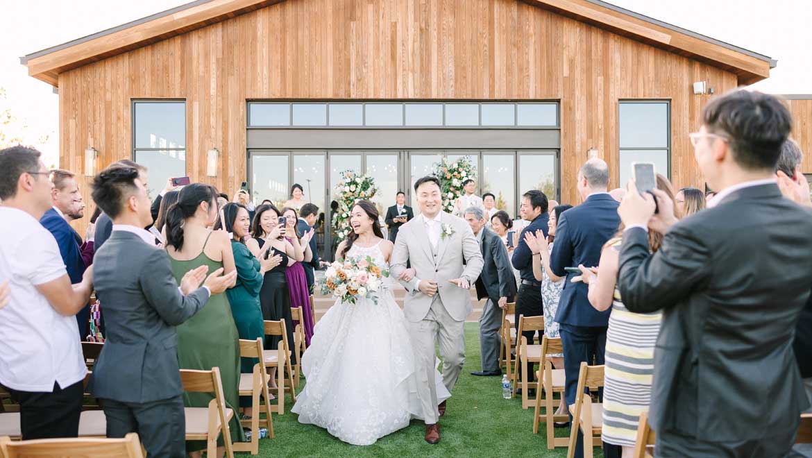 Bride and groom exiting the ceremony.