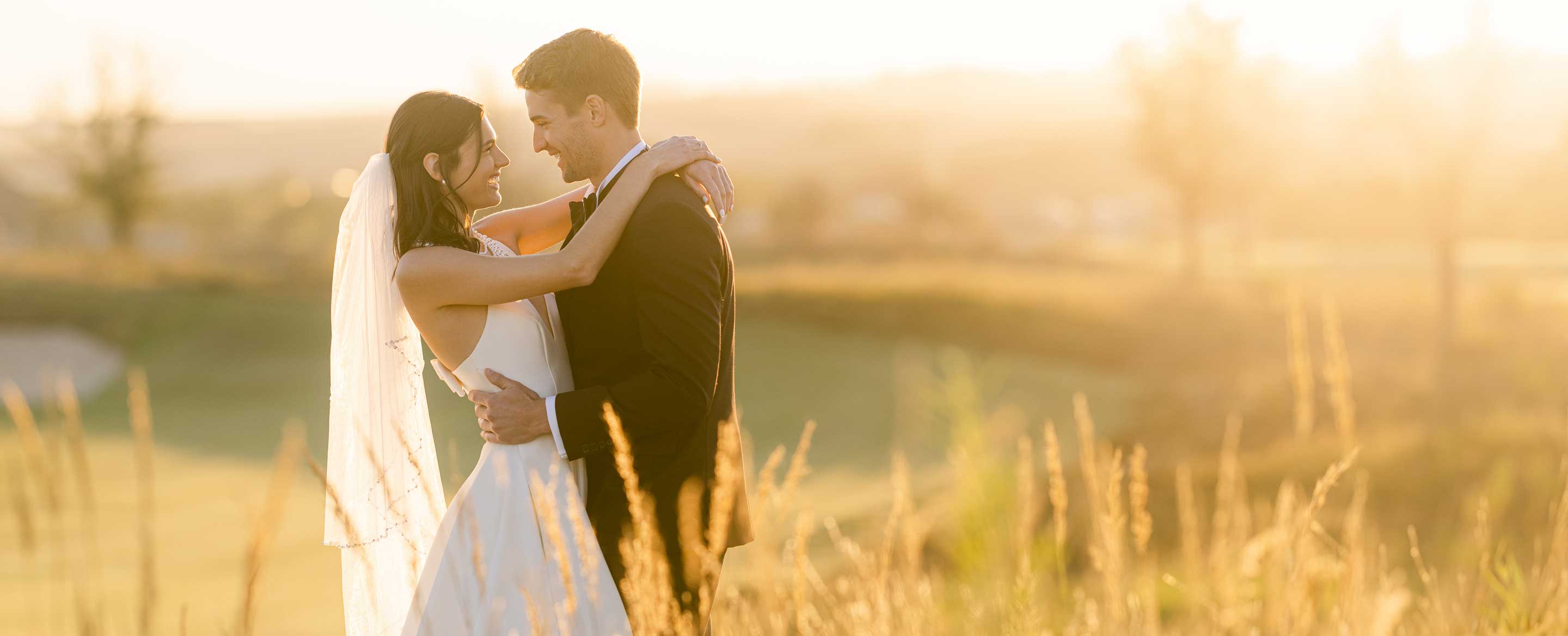 Couple in wheat field.