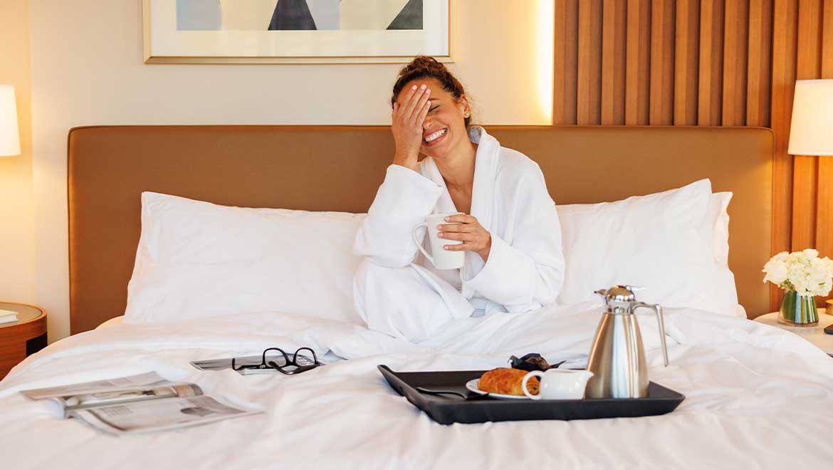 Woman holding coffee cup