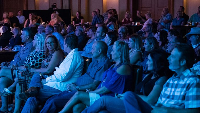 Guests watching the show.