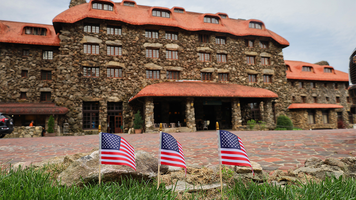 hotel exteior with american flags
