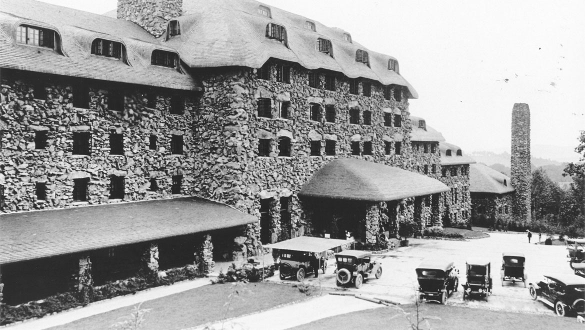 East front entrance with cars