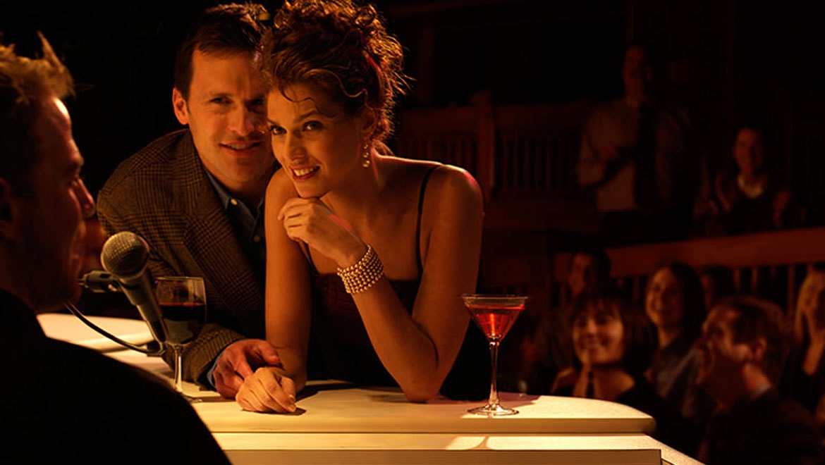 Couple at piano bar in Asheville