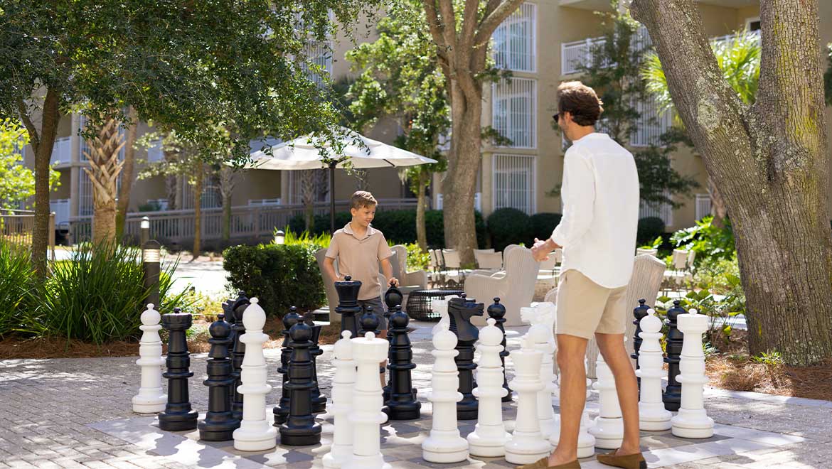 Father and son playing chess