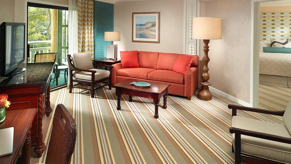 Newly renovated traditional one bedroom suite with king bed and parlor with sofa