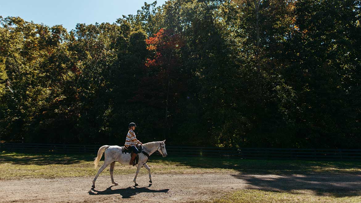 Woman horseback riding