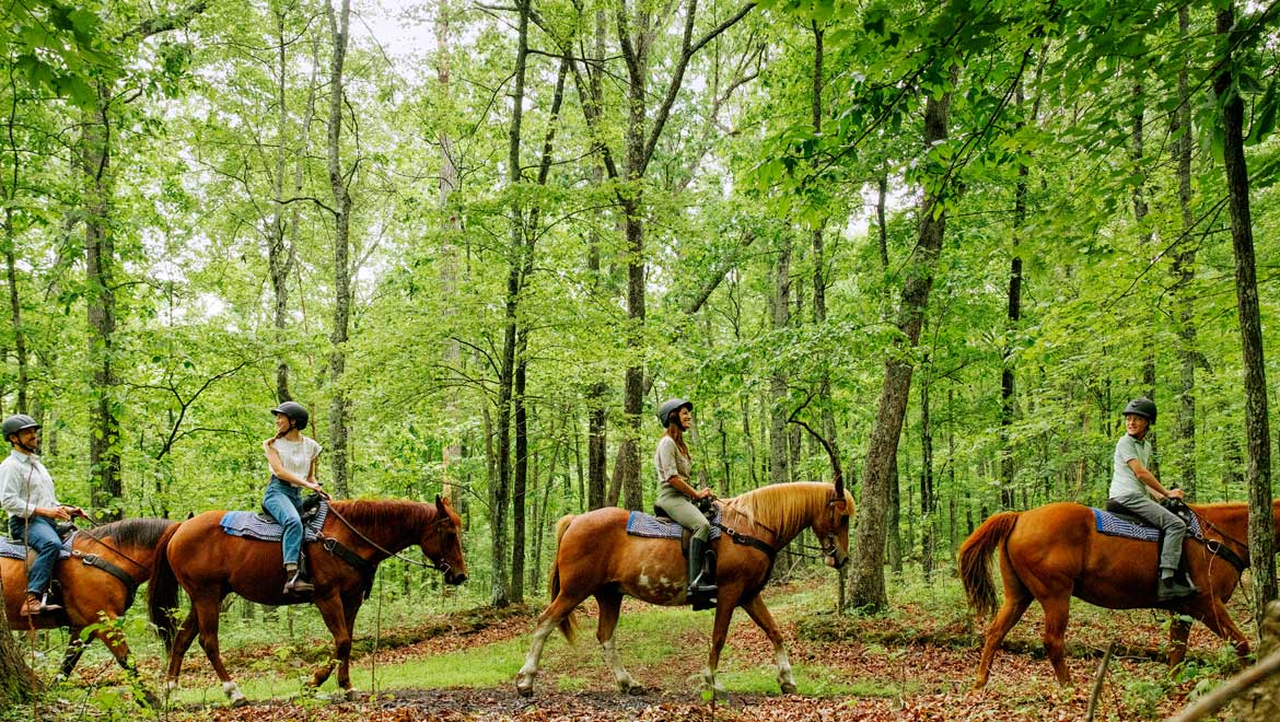 People riding horses.