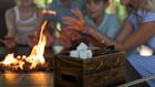 Family making smores.