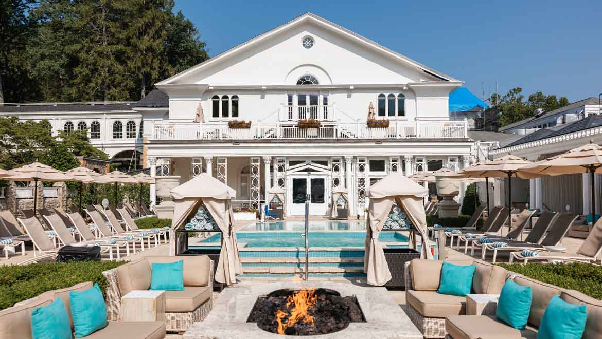 Outdoor fire pit by the pool