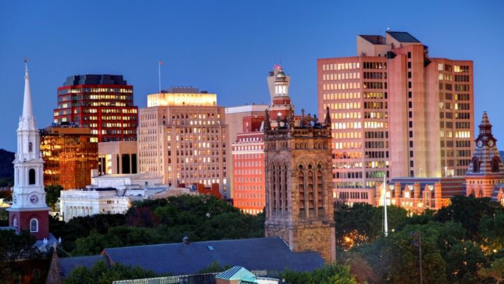 New Haven city skyline at dusk.