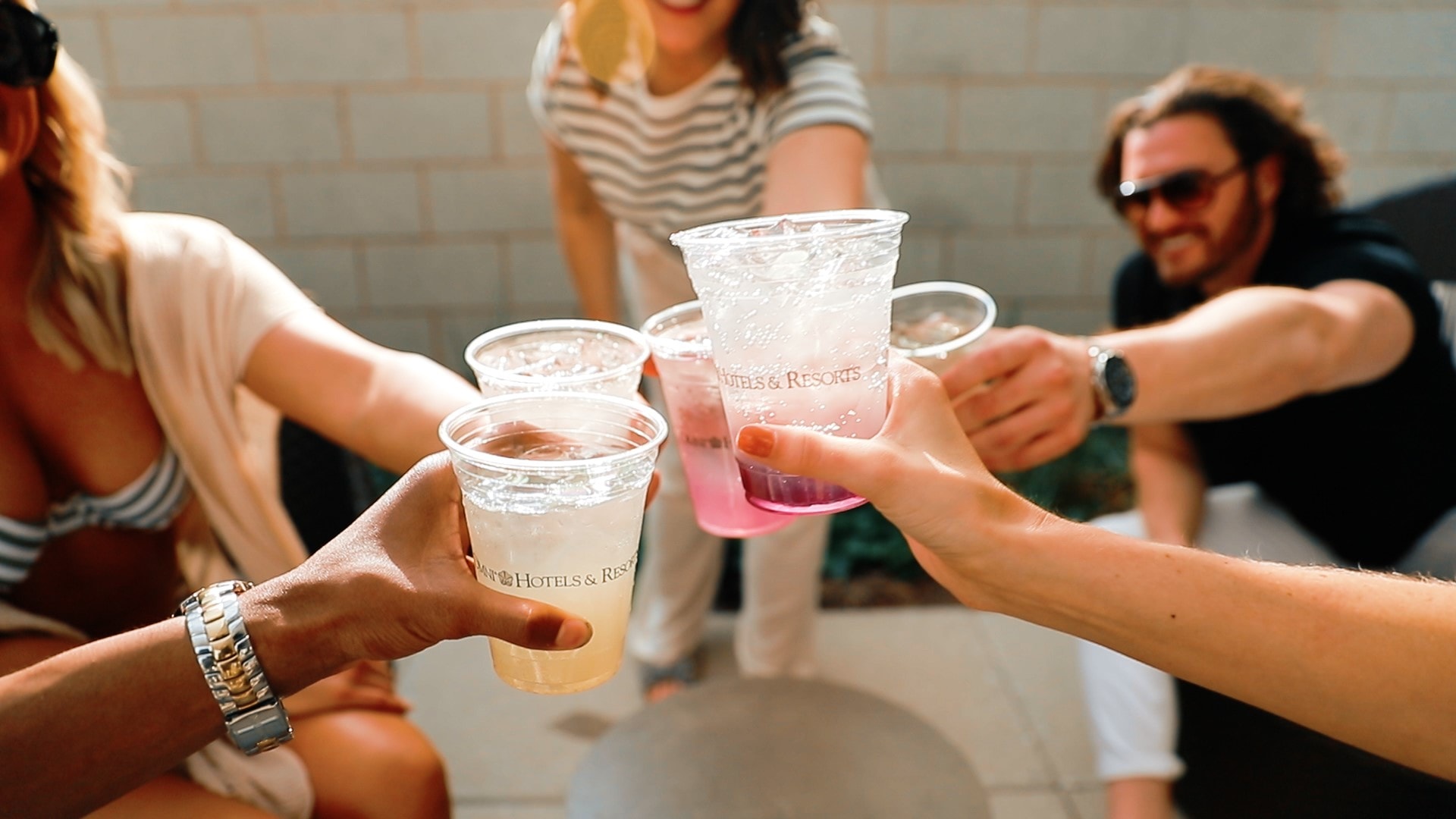 People toasting drinks