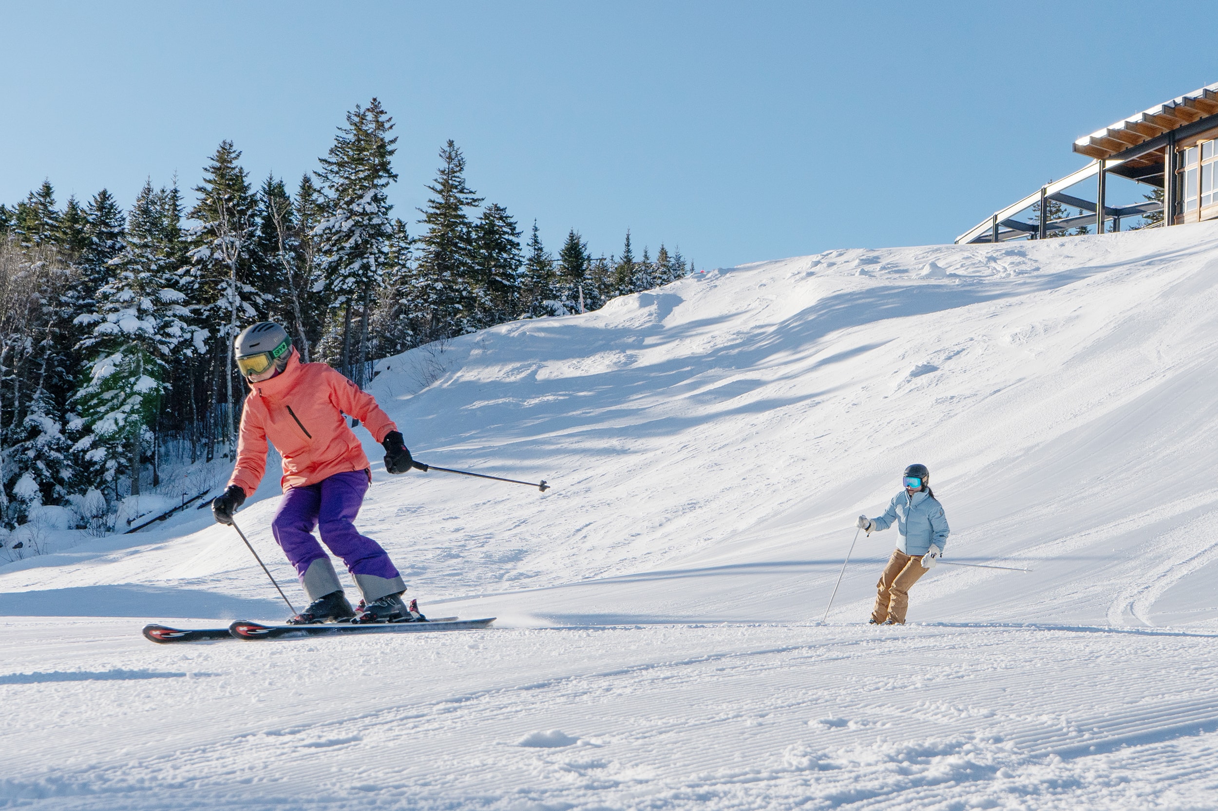 Skier going down a slope