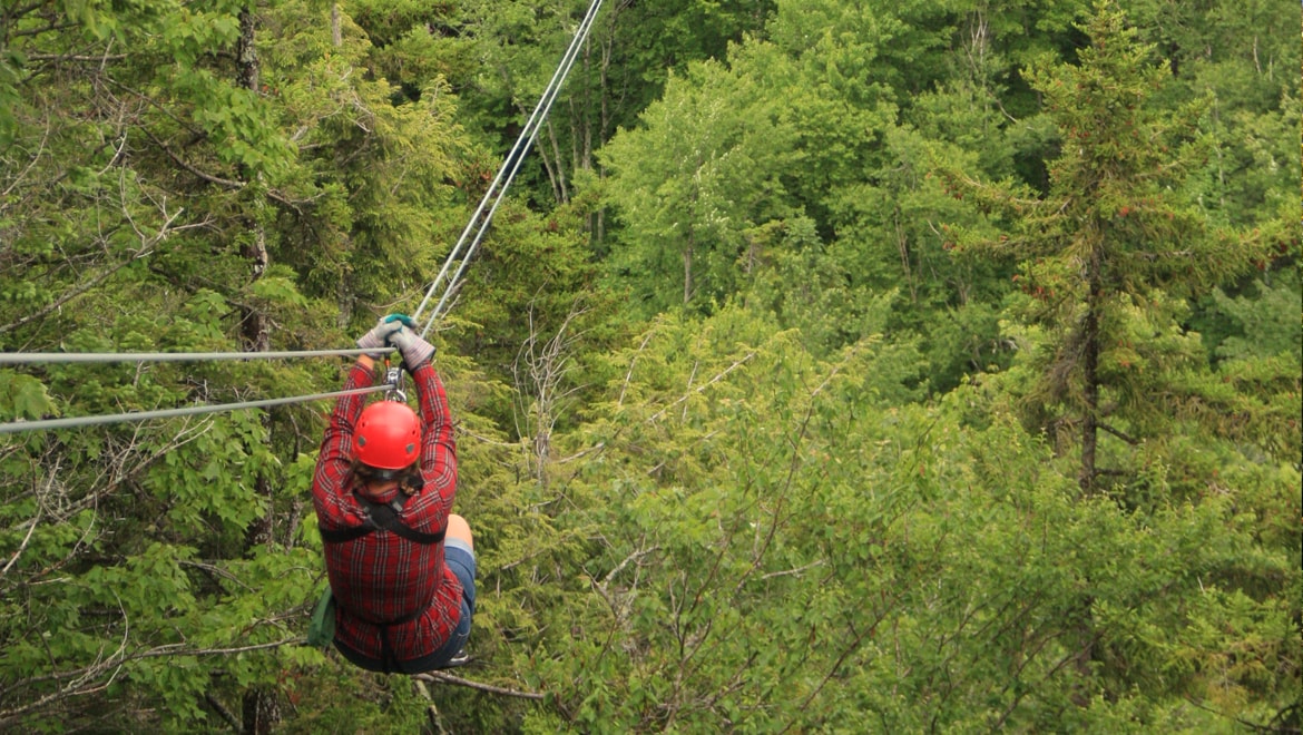 Person ziplining