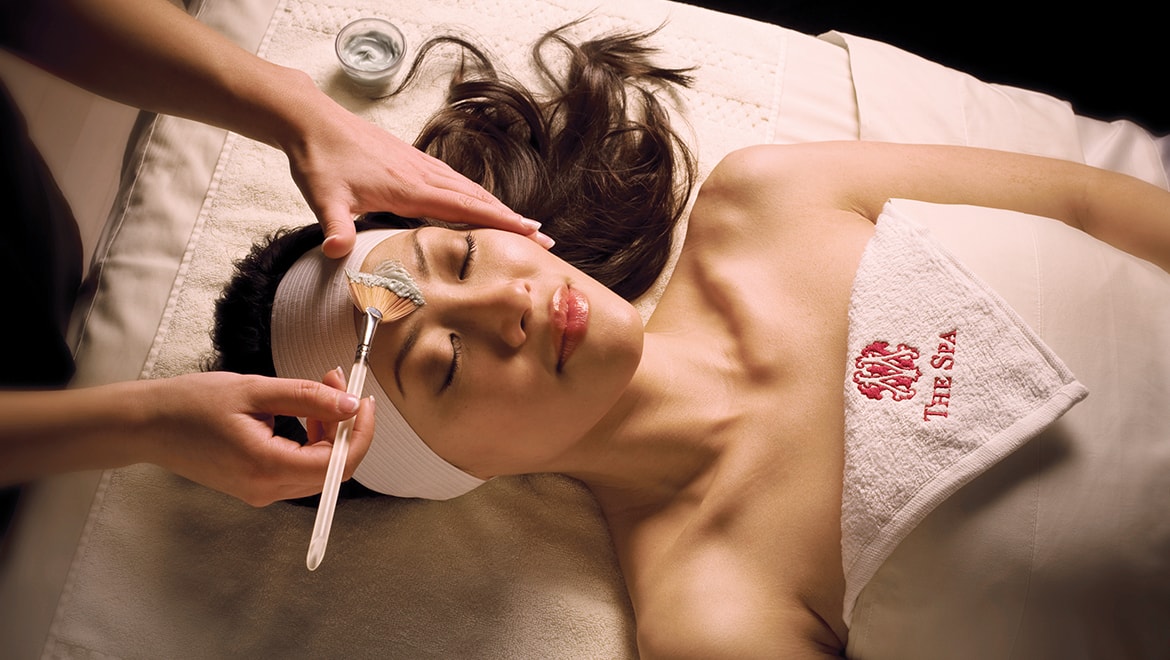 Woman receiving a facial