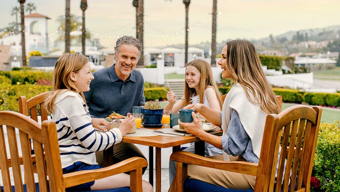 Family dining outdoors.
