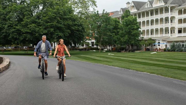 Couple riding bikes.