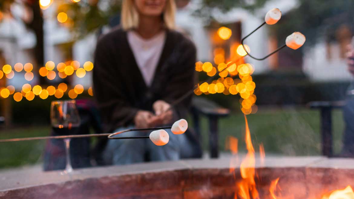 Woman roasting marshmallows