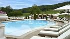 Outdoor Pool Image With Cabanas