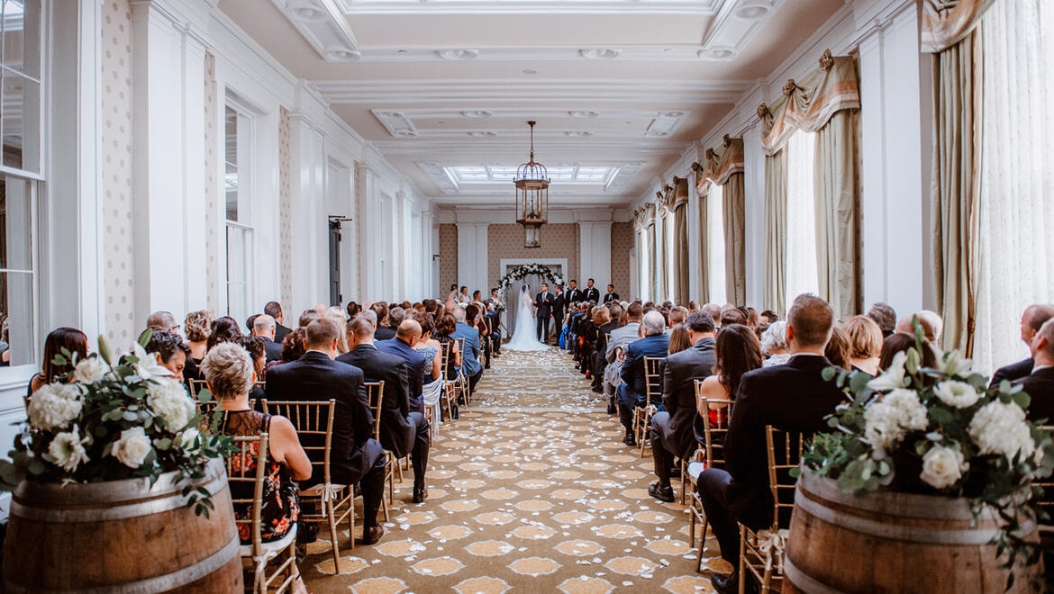 People seated for wedding.