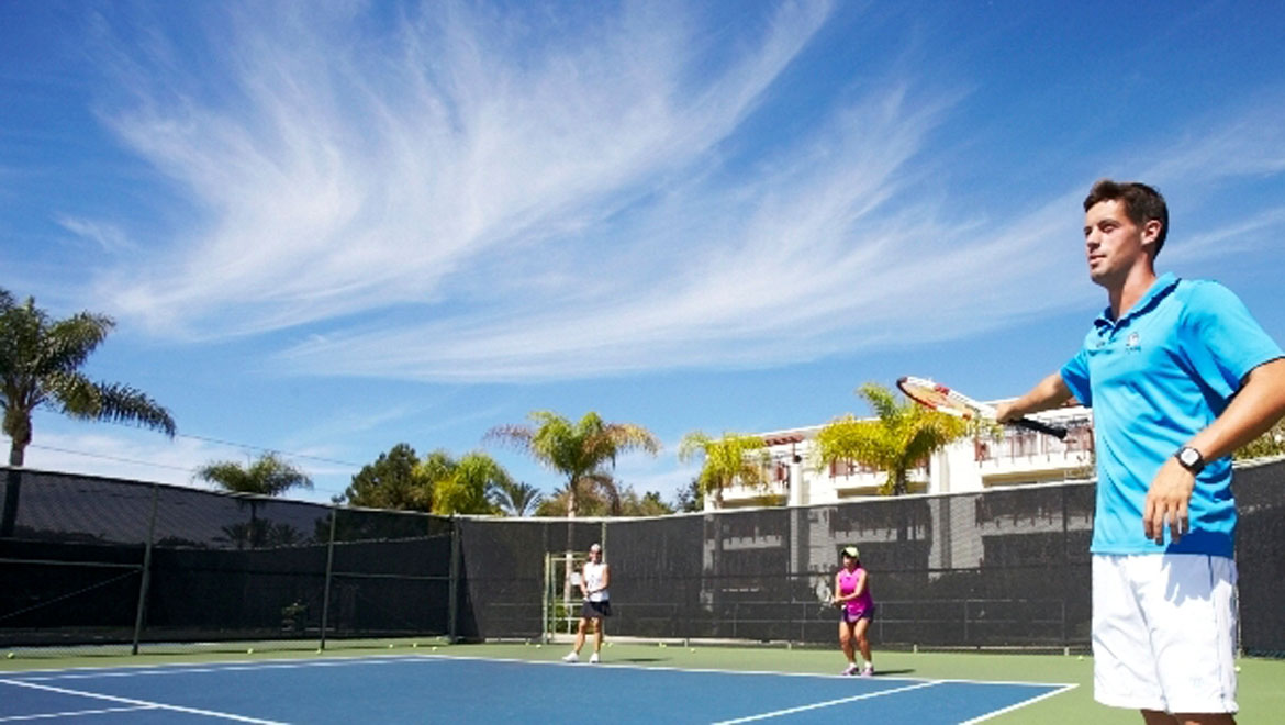 Young man playing tennis