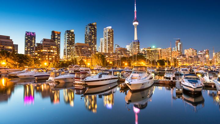 city lights view near boats