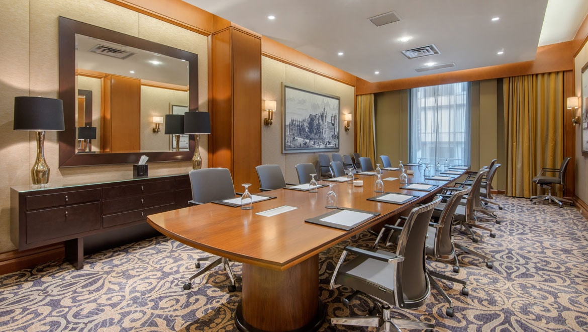 Boardroom table in meeting space.