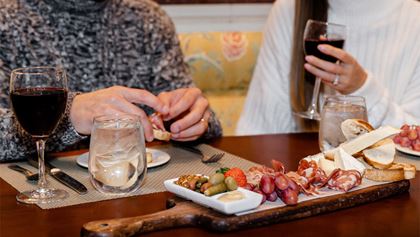 People enjoying appetizer. 